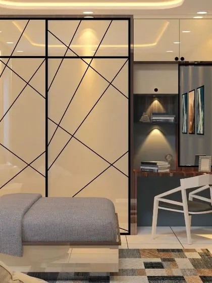 A bedroom featuring a large sliding wardrobe with a geometric line pattern. The room also includes a compact study desk, making it a perfect space for a teenager or young adult.
