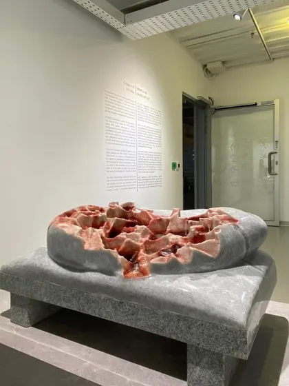 A striking sculpture by L.N. Tallur, which explores themes of materiality and form. The gallery's minimalist design ensures that the focus remains squarely on the complex narrative of the artwork.