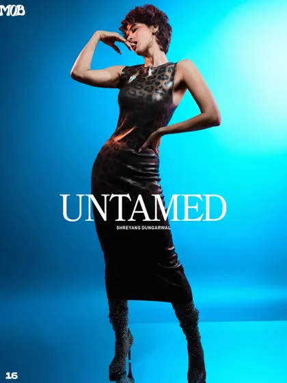 The title page for the "Untamed" editorial in MOB Journal, featuring a powerful, statuesque pose.