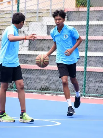 Players from different teams compete for the ball, a moment of intense action from our interschool tournament.