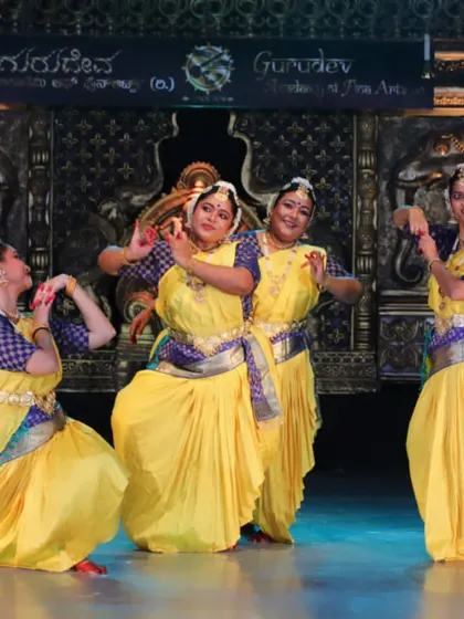 A full gallery from a special performance in my hometown after 25 years, showcasing a full group of dancers on a professionally lit stage.