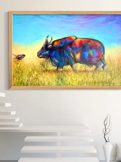 This colorful painting of an Indian Gaur is a beautiful example of abstract wildlife art. The artist uses a vibrant palette to highlight the animal's form, creating a piece that is both realistic and imaginative.