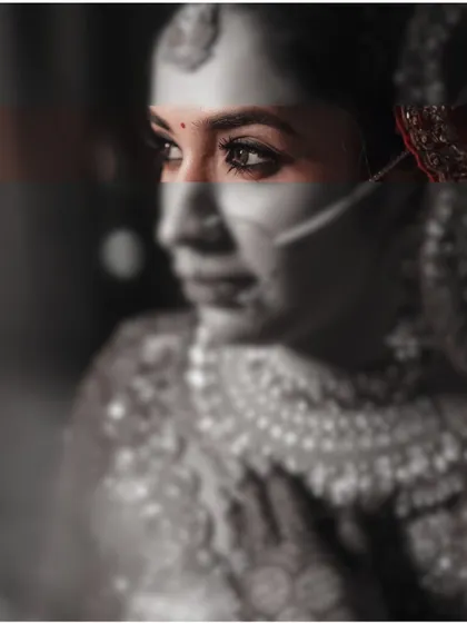 An artistic, moody close-up of the bride's eyes, creating a sense of mystery and capturing the depth of her emotions.