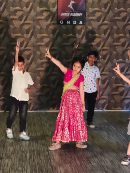 The kids showing off their final pose from the 'Ladki Deewani' choreography. It's all about having fun and striking a pose!