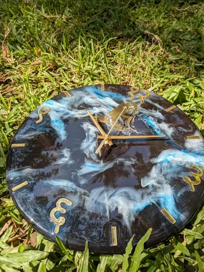 This is a Shivji-themed wall clock with a galaxy background. The mix of deep blues, blacks, and whites creates a cosmic effect, perfect for a spiritual yet modern piece of decor.