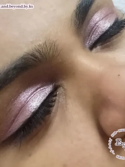 Another angle of the pretty pink and silver eye makeup, showing the soft blend and clean liner.