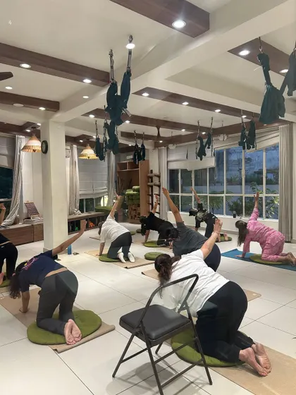 A full class using various props like chairs and wheels to modify and enhance their practice. This demonstrates our philosophy that yoga is adaptable for every individual.