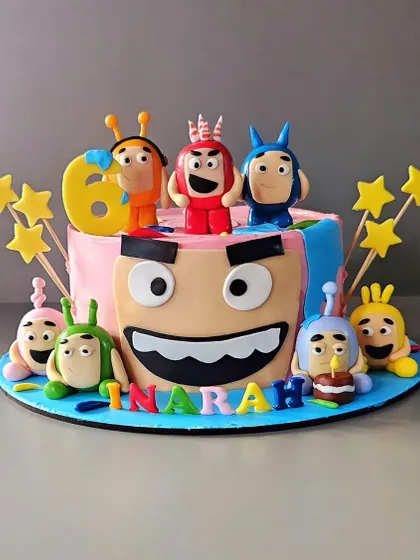 An Oddbods cake for little Inarah's 6th birthday. This almond sponge cake is decorated with all the colorful and quirky Oddbods characters, handcrafted from fondant.