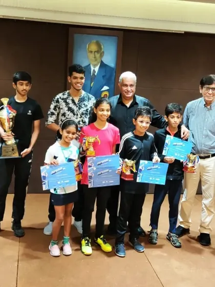 A group of our young winners from the CCI Greater Mumbai District Badminton tournament posing with their trophies and certificates.