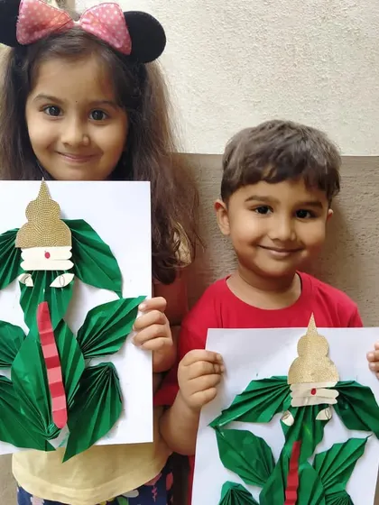 Look at the pride and joy in their creations! For Ganesh Chaturthi, children used various materials like clay, leaves, and paper to create their own Ganesha figures. This is a wonderful fusion of art, culture, and personal expression.