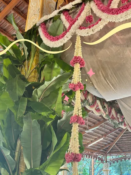 The beautiful hanging flower decorations, with a simple doodle to add a touch of whimsy.