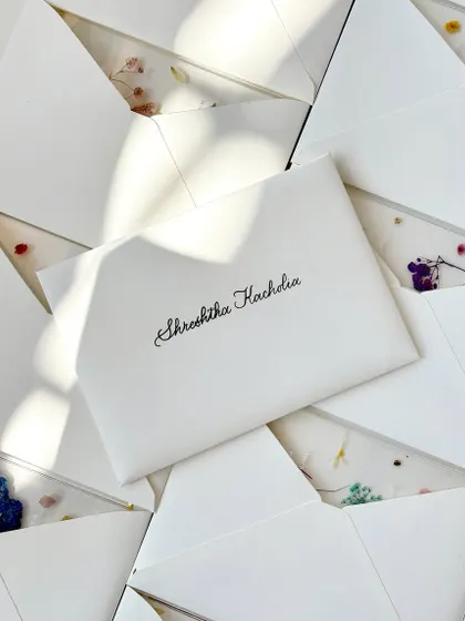 The finishing touches for the Adidas project. Each personalized certificate was enclosed in a subtly textured white envelope, carefully addressed with a brush pen, and sealed with a dark grey custom Adidas wax seal.