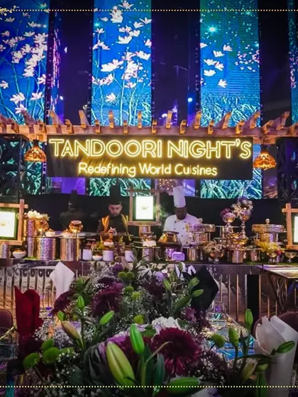 Our branded live station at a glamorous event, set against a stunning digital backdrop. This setup highlights our ability to integrate modern technology and branding into our presentation.