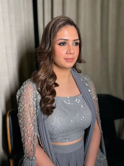 A sparkly, smokey eye for this client's evening event. This look is perfect for a Sangeet or cocktail party, paired with a modern grey lehenga.