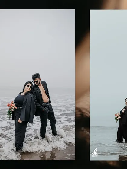 A moody and stylish pre-wedding shot of a couple in black suits, standing confidently in the ocean waves.