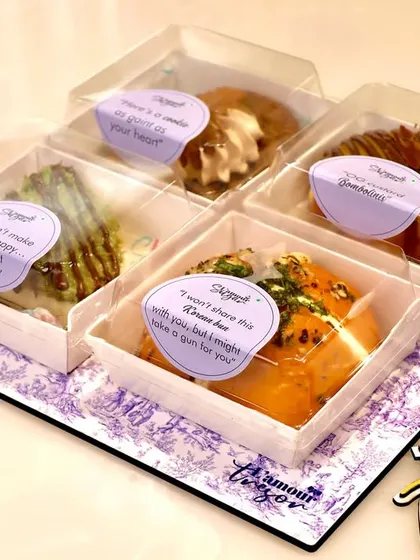 We add a personal touch with fun messages on our Rakhi treats. This assorted box is packed and ready for gifting, complete with individual packaging to keep everything fresh.