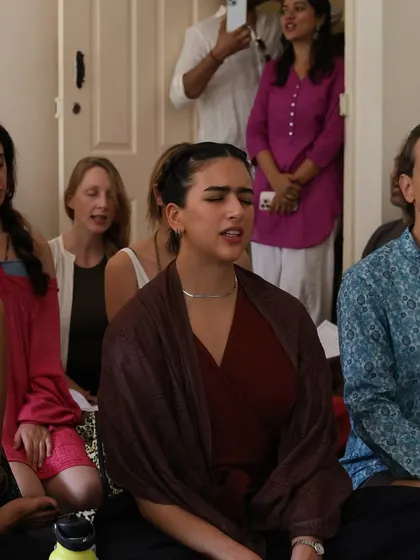 A student deep in the experience of a kirtan session. When we chant together, we create a shared field of devotion and high vibrational energy that is deeply healing.