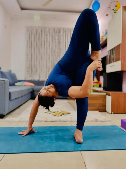 Mastering the Super Soldier Pose after a session of pure perfection. This is an intense twist and stretch that requires both strength and flexibility.