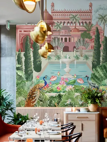 In this restaurant, our Vintage Mughal Garden wallpaper provides a stunning backdrop for an elegant dining experience. The design transports guests to a world of historical grandeur.