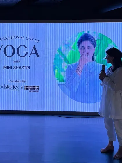 Presenting at an International Day of Yoga event. I am passionate about sharing the wisdom of yoga with a wider audience, making its profound benefits accessible to everyone.