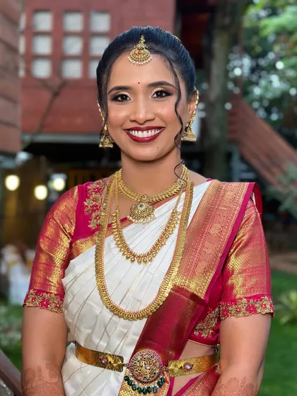 Another angle of this stunning muhurtham glow. The makeup is designed to be waterproof and long-lasting, ensuring she looks fresh and radiant throughout the entire wedding ceremony.