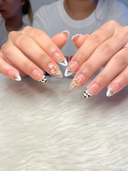 A full view of the mixed-media nail art set, showing the balance between the different designs on each finger.