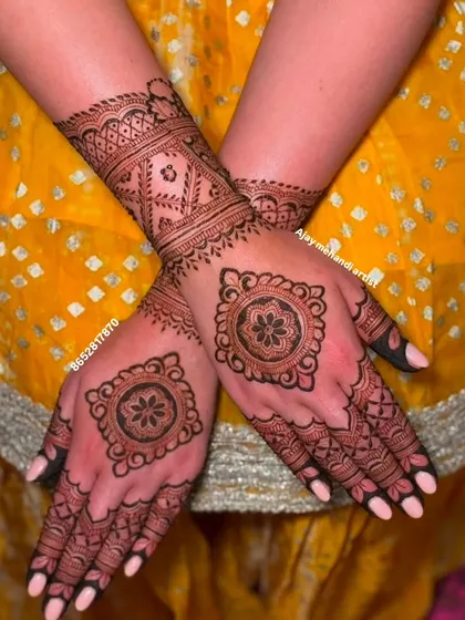 Another beautiful example of matching mandala designs for a guest. The wristband pattern adds a bracelet-like effect, completing the look.