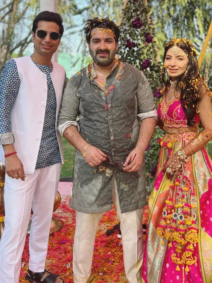 Posing with the wonderful couple after their fun-filled haldi ceremony. It was a spectacular event, and I was thrilled to be a part of their celebration.