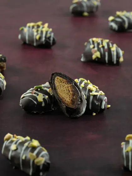 Our Kunafa Date Crunch chocolates are a delightful fusion of textures and flavours. Each one is filled with crunchy Kunafa and coated in rich chocolate.