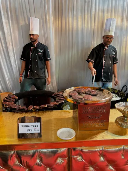 My chefs at the Surmai Tawa Fry station, ready to serve.