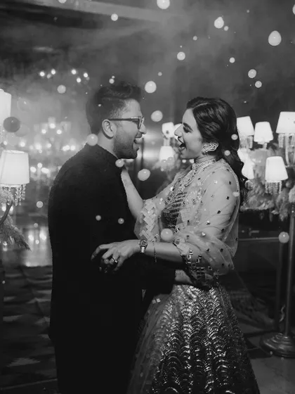 A candid, happy moment between the couple amidst a sea of bubbles on the dance floor. We focus on creating an environment where everyone can let loose and have fun.