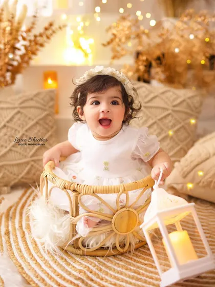 Another joyful shot from the boho first birthday session, capturing the pure excitement of the little one.