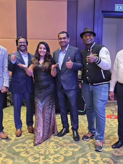 Posing with the founders of Bitsilica after a successful event. Their appreciation and the crowd's energy made it a fantastic night.