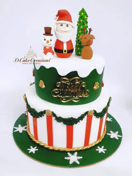 A charming two-tier Christmas cake with classic holiday characters. This design features edible figurines of Santa, a snowman, and a reindeer on top of festive red-and-white striped and green tiers.