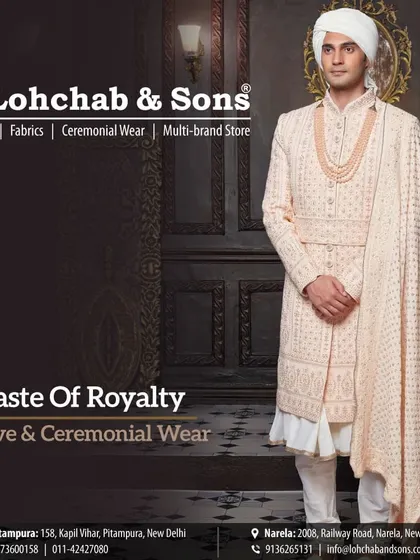 Experience a taste of royalty with our festive and ceremonial wear. This groom's ensemble features a beautifully textured off-white sherwani, a matching stole with a detailed border, and a layered look over a flared inner kurta for a truly regal silhouette.