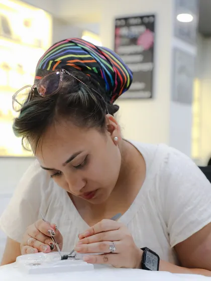 Every student gets the chance to perfect their craft. Here, a student is concentrating on her technique during a hands-on practice session.