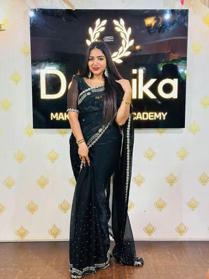 A simple and elegant look. Here I am in a beautiful black saree, ready for an event. Sometimes, less is more.