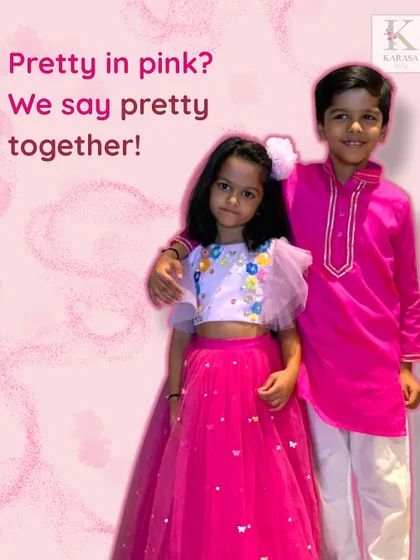 Pretty in pink, and even prettier together! This coordinated set features a vibrant pink kurta for the brother and a matching floral embroidered lehenga for the sister.