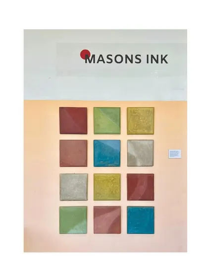 A display of Tadelakt tiles in various natural pigments. This traditional waterproof lime plaster is both decorative and highly functional.