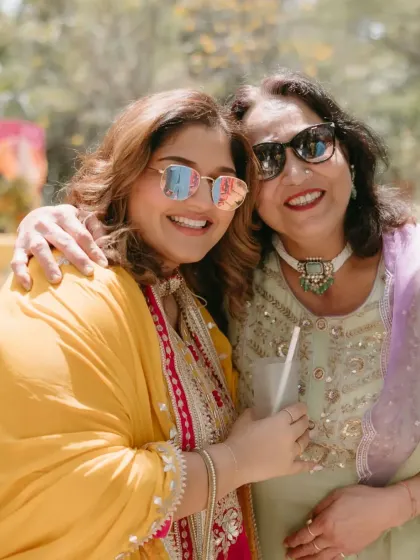 A beautiful, candid moment between a mother and daughter at a Haldi ceremony. I believe weddings are about celebrating family bonds and creating lasting memories together.