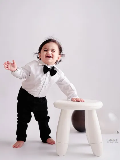 We capture all the emotions, not just the smiles. This candid shot shows a real, unposed moment that is just as precious and memorable as a perfect portrait.