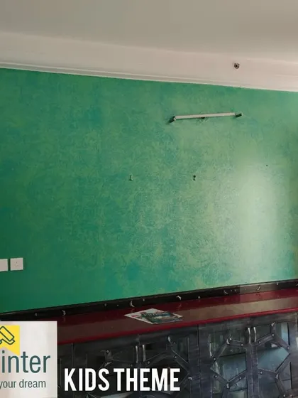 A green textured wall for a kids' room, providing a vibrant and energetic backdrop that is also durable and easy to maintain.