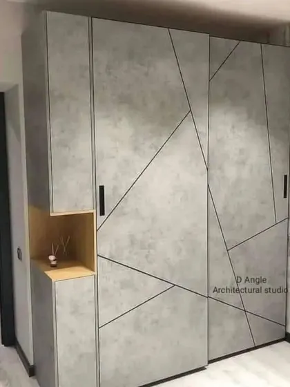 An innovative wardrobe design with a geometric pattern, showcasing our ability to create unique and artistic furniture pieces.