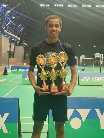 **U-19 Boys' Doubles Bronze Medalist.** Sanrekh Chaurasiya with his three trophies after a strong performance at the U.P. Major U-19 tournament.