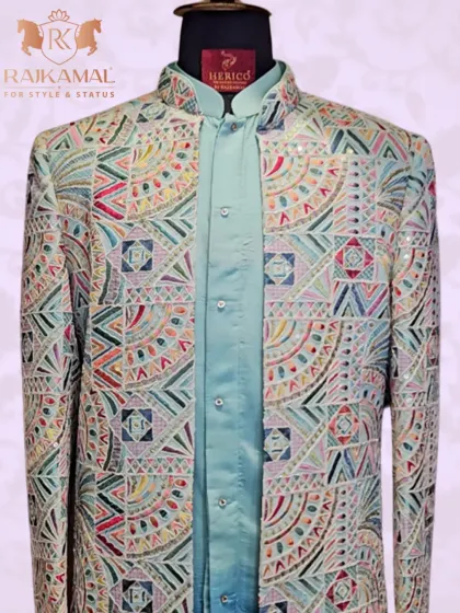 A full view of the geometrically embroidered jacket on a mannequin, emphasizing its modern and majestic appeal.