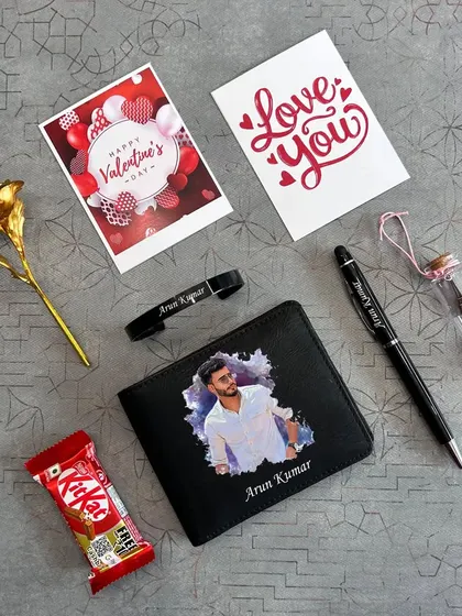 A romantic gift set featuring a wallet personalized with a photo splash design. The set also includes a custom pen, bracelet, a golden rose, and Valentine's cards.