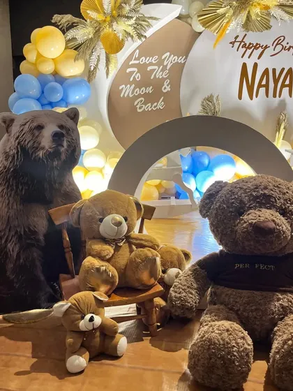 A detailed shot of the adorable teddy bear props, including a large realistic bear figure.