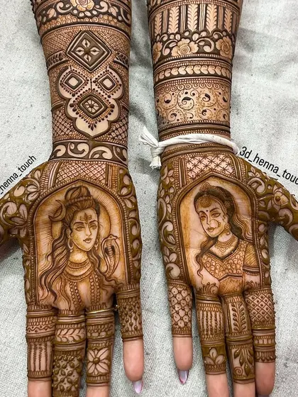 For a bride who wanted a divine theme, I created portraits of Lord Shiva and Parvati. This adds a spiritual and powerful element to the bridal mehndi.