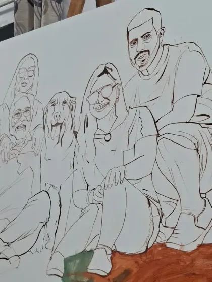 The line work stage for a large family portrait. Every person and pet is carefully drawn to ensure the composition is balanced and the individual likenesses are accurate before painting begins.