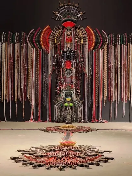 An image of an artwork from the Kochi Biennale that inspired my 'Reclaiming Red' series, showing my process of drawing from the world around me.